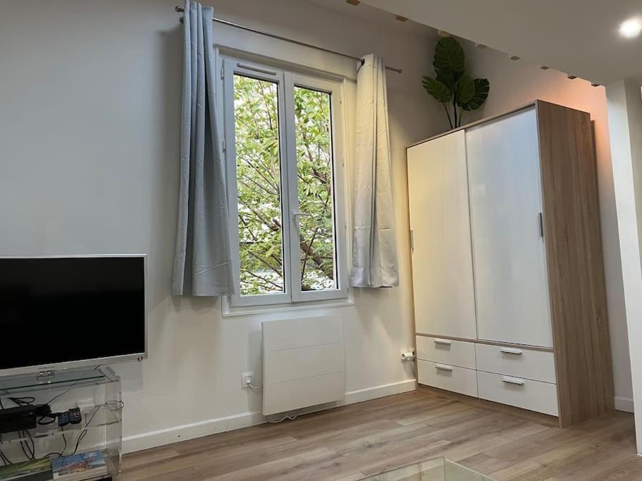 Paris : Charmant 2 Pieces Au Calme Apartment Bagian luar foto